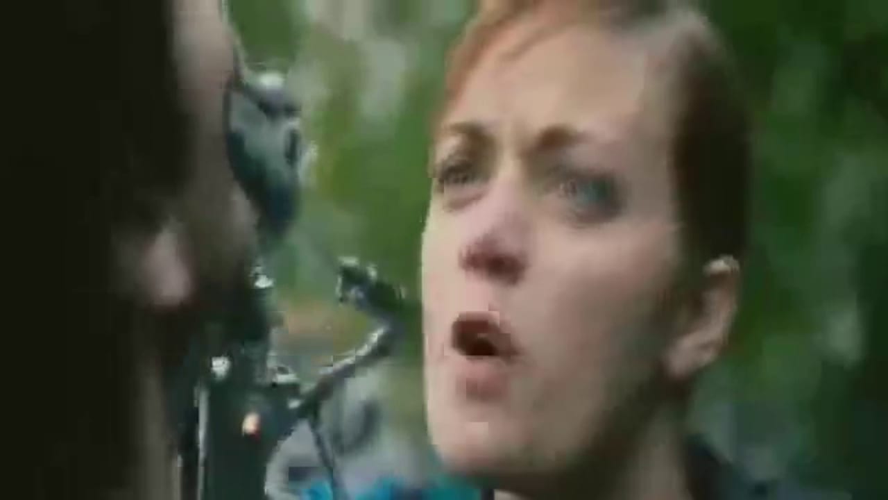 Fix pixelated video example, before: a woman with short auburn hair mid-sentence, her face a soft block-smeared blur before the fix